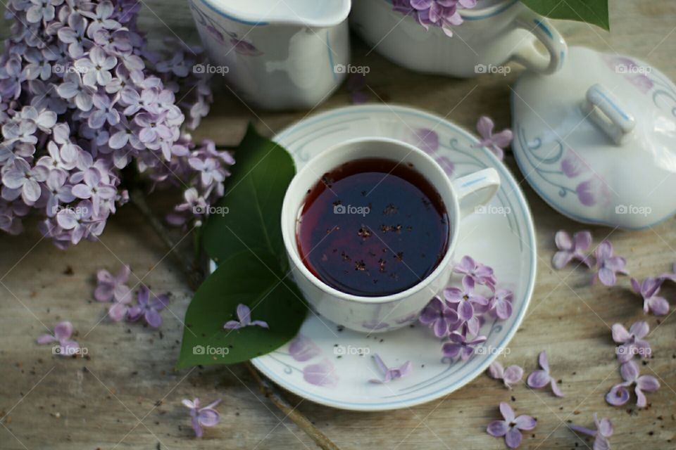 Purple flowers with tea