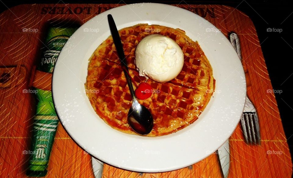 Waffle and Ice cream with a cherry on top