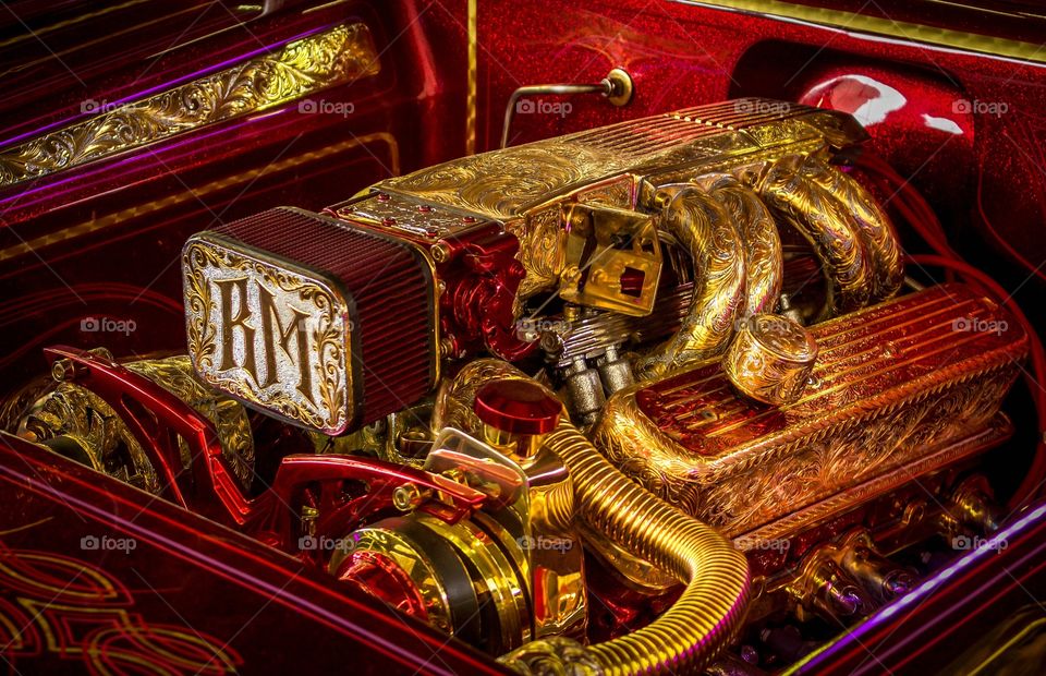 Beautiful engraving on a custom low rider.