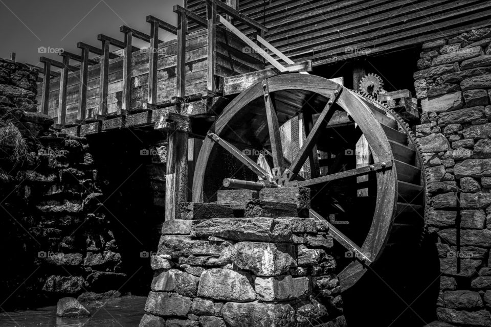 Foap, Color vs Black and White: The flume and waterwheel of the old gristmill at Historic Yates Mill County Park in Raleigh North Carolina. 