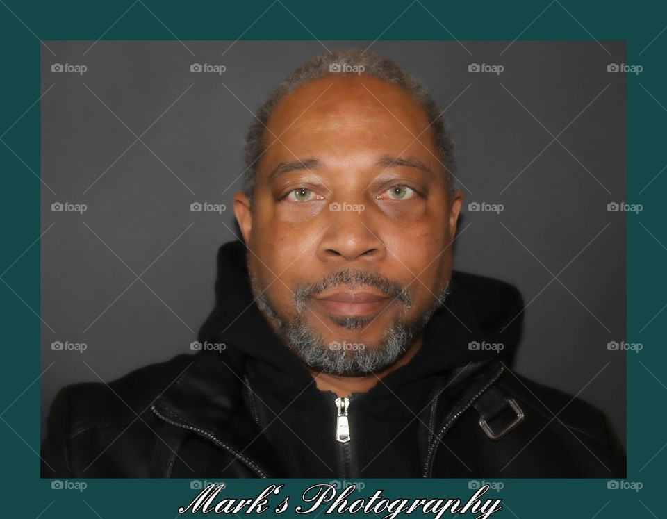 self portrait with a black background at a home studio in Citrus Heights California