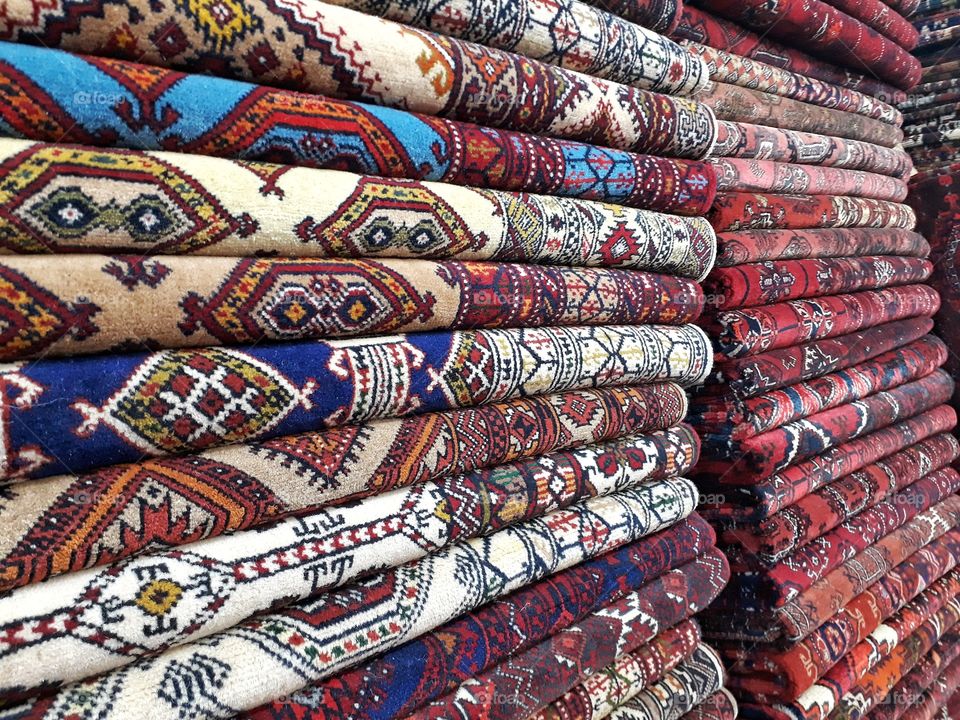 old Afghan wool carpets from a carpet bazar