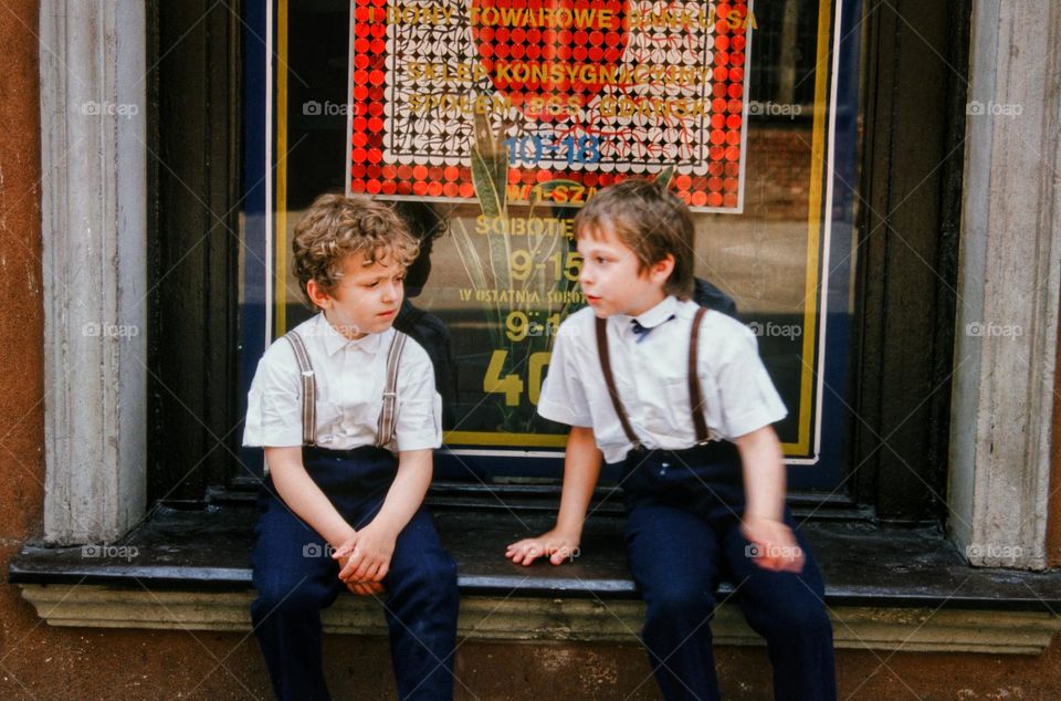 boys in a window