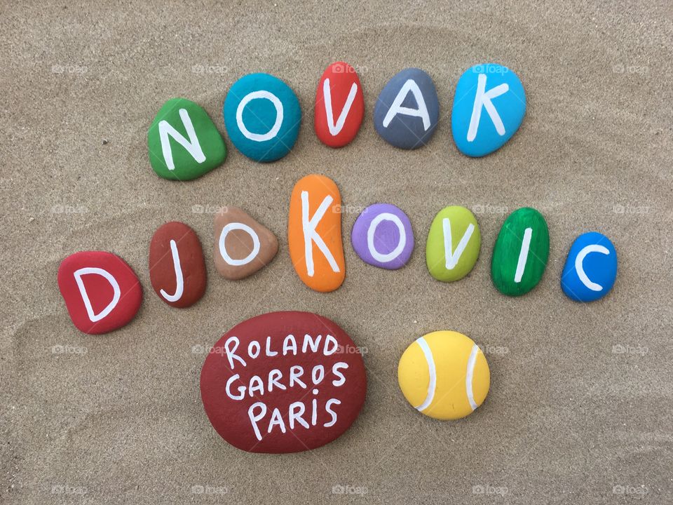 Novak Djokovic, serbian professional tennis player at Roland Garros, souvenir on colored stones 