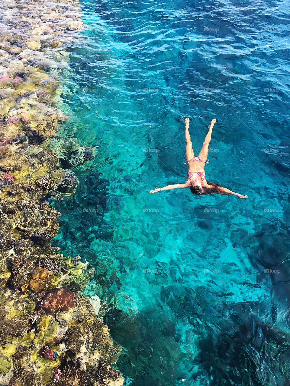 Woman swimming in sea