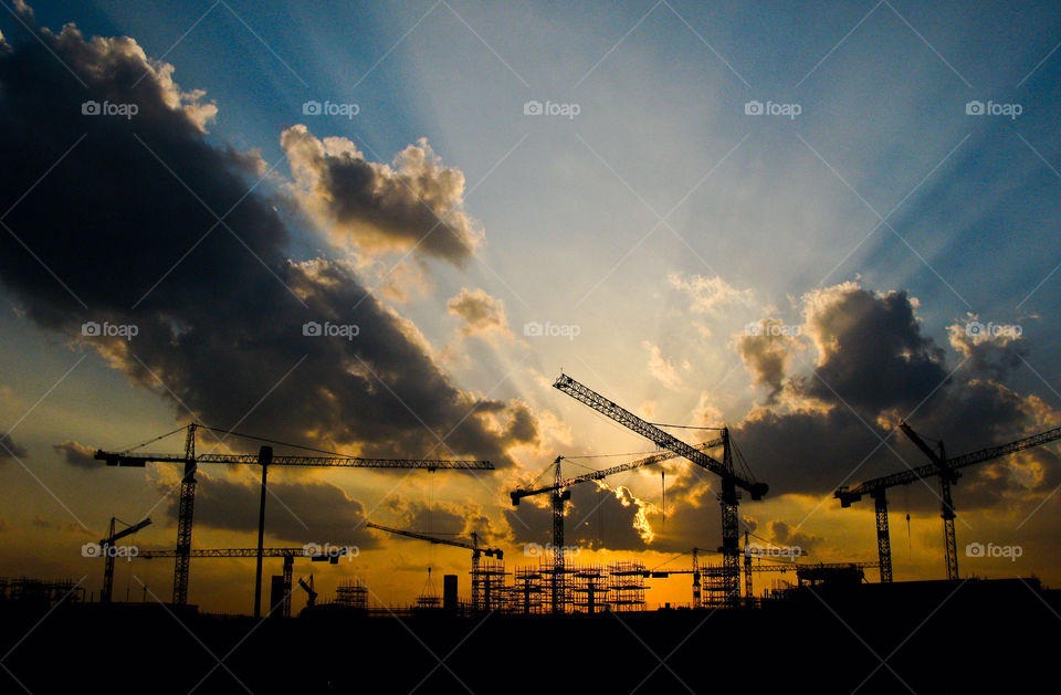 sky construction sunset clouds by chrisc