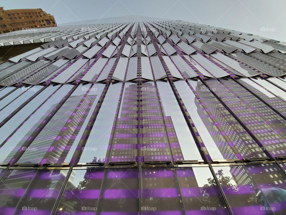 Looking straight up One World Trade Center, also referred to as Freedom Tower in New York City gives visualization to how tall it is