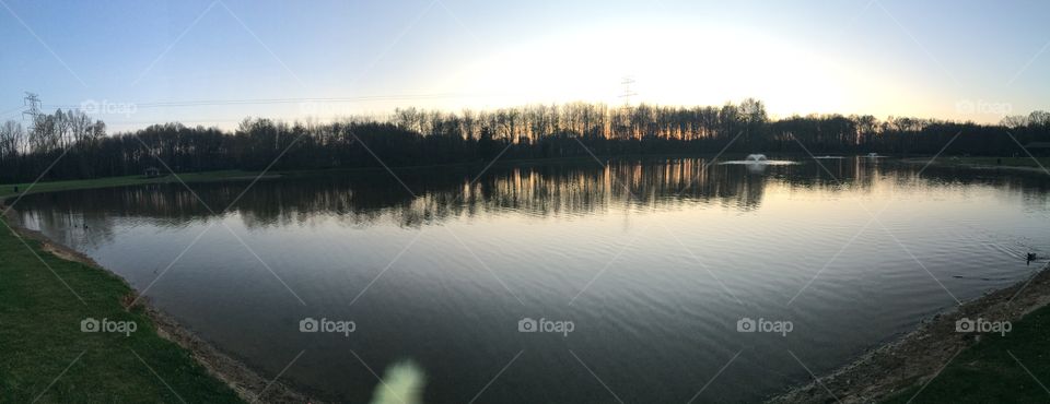 Panorama of a beautiful lake at sunset