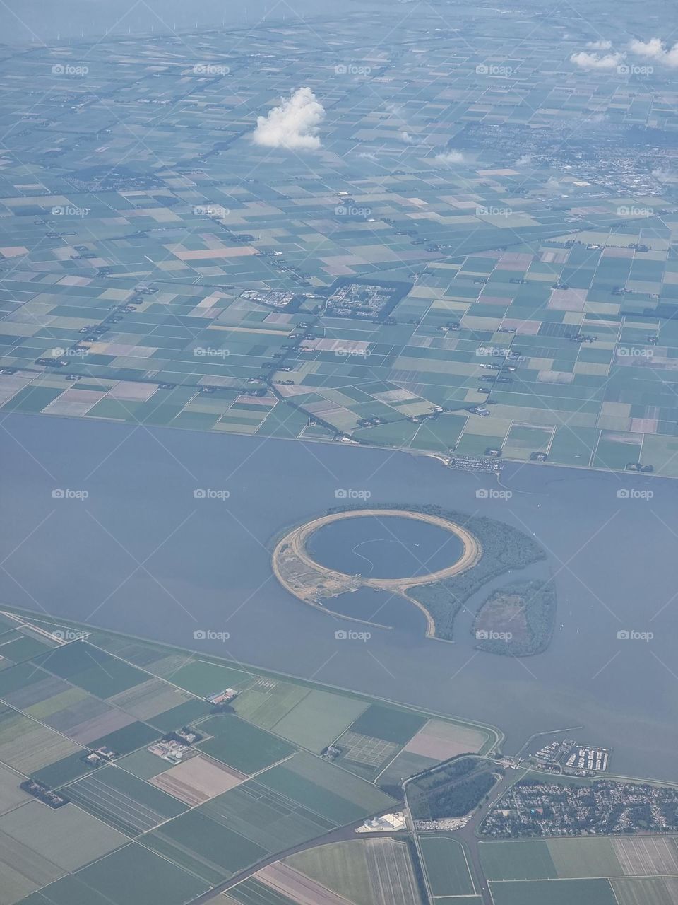 Aerial view of the "IJsseloog", an artificial island in the Ketelmeer in the Netherlands,  to store polluted sludge