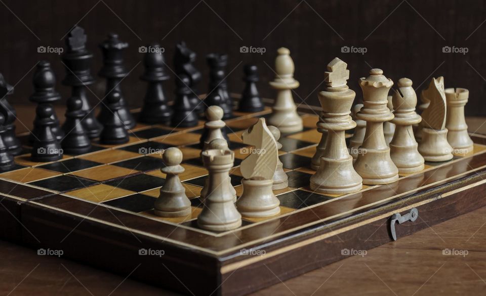 A wooden chess set - board & pieces
