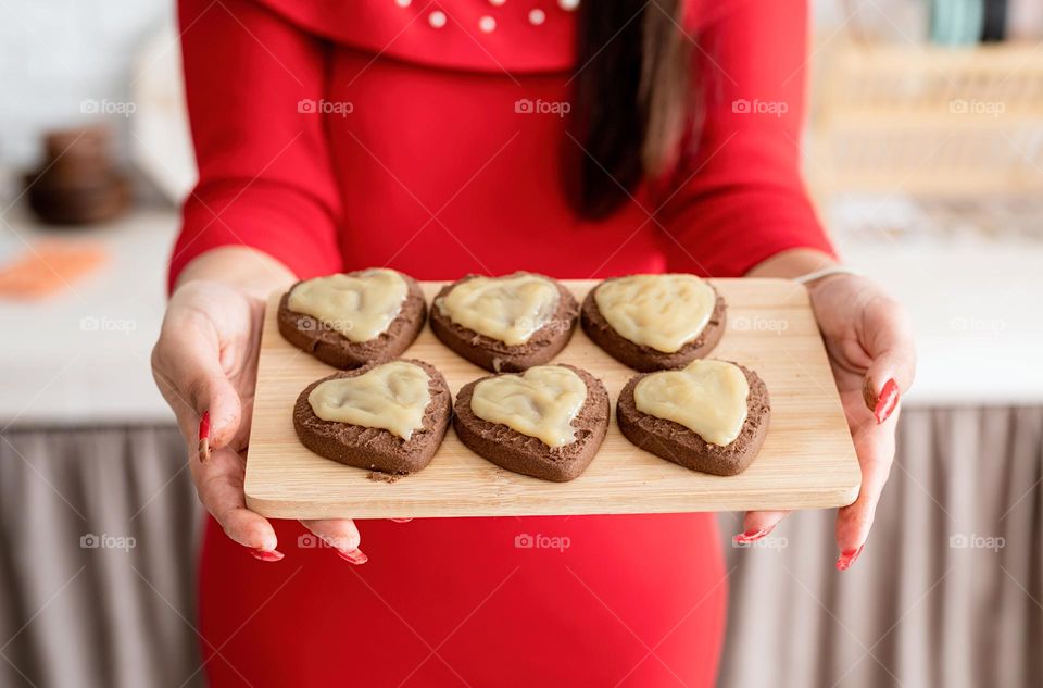 cooking heart shaped cookies at the kitchen