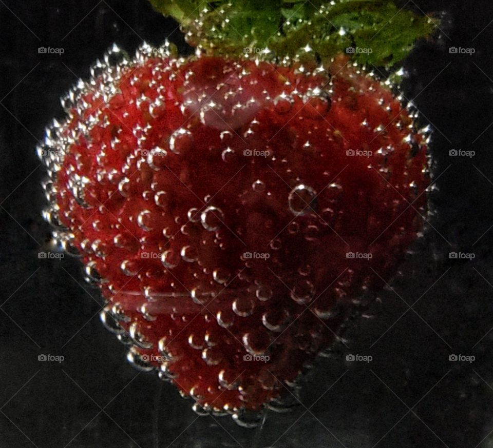 Effervescent red sweet juicy strawberry ready to taste.