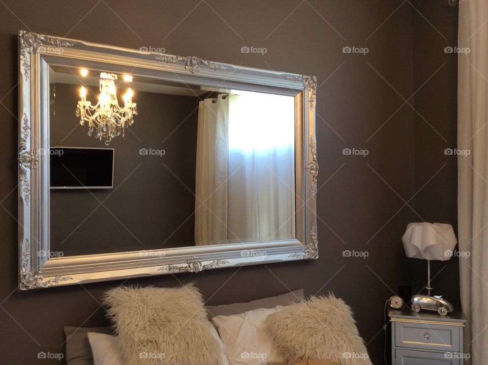 Silver Mirror in Bedroom