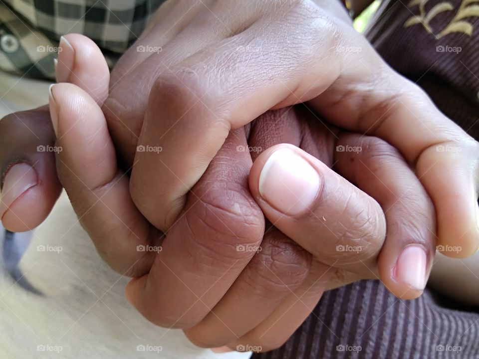 Close-up of holding hand