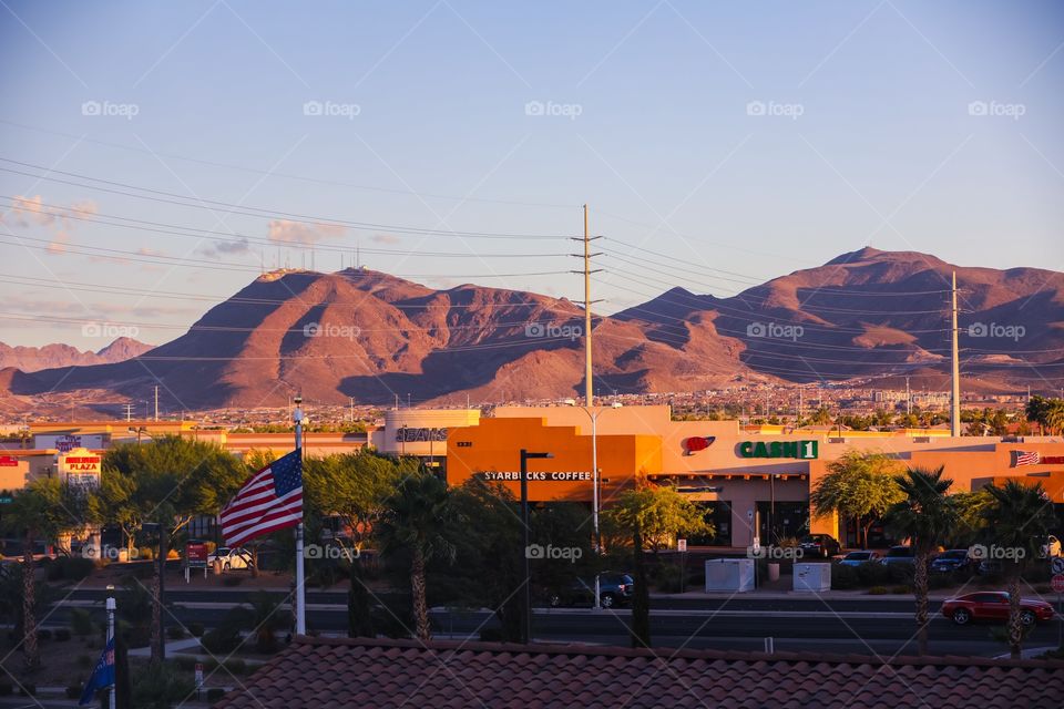 Twilight over a small town in the middle of the nation with the American flag. 🇺🇸