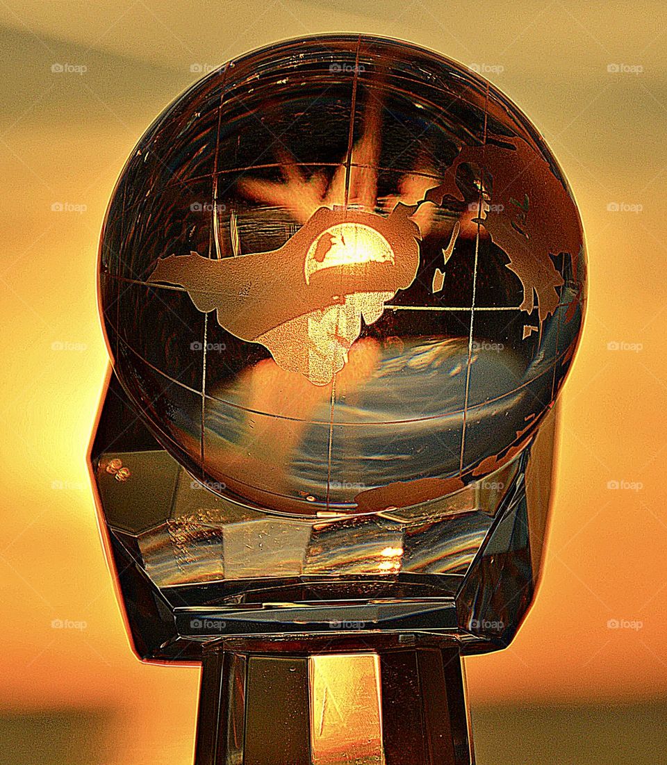 Crystal ball at sunset - Looking through a crystal ball during a spectacular and colorful sunset