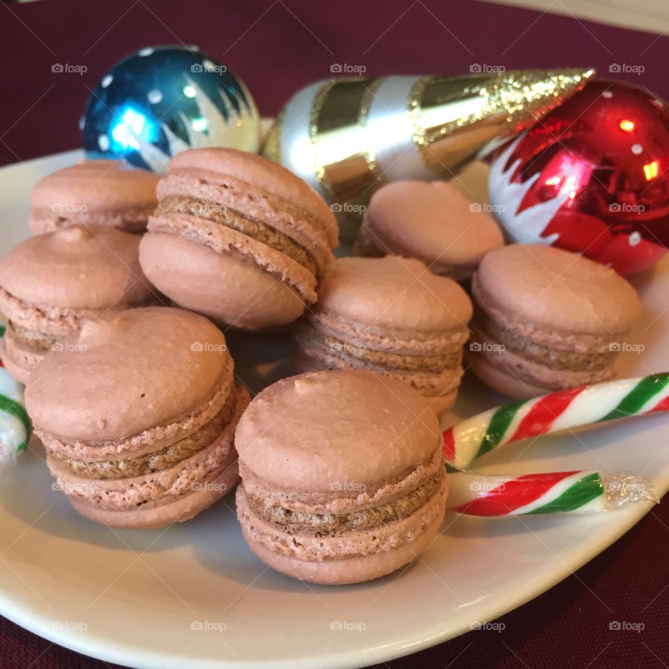 Macaroon on plate with christmas decoration