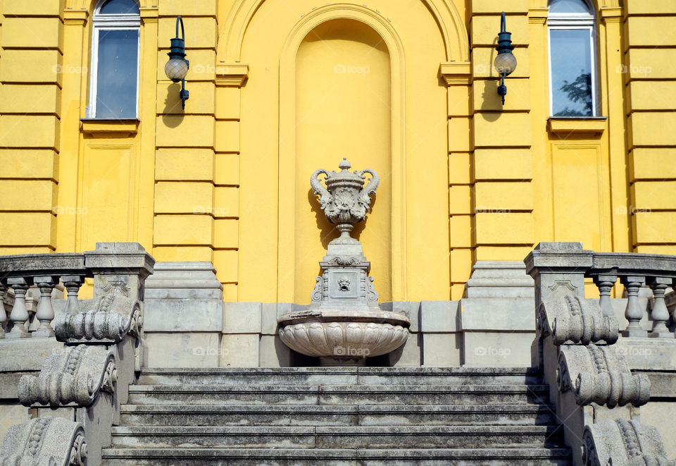 Yellow coloured facade of Széchenyi Thermal Bath in Budapest, Hungary.