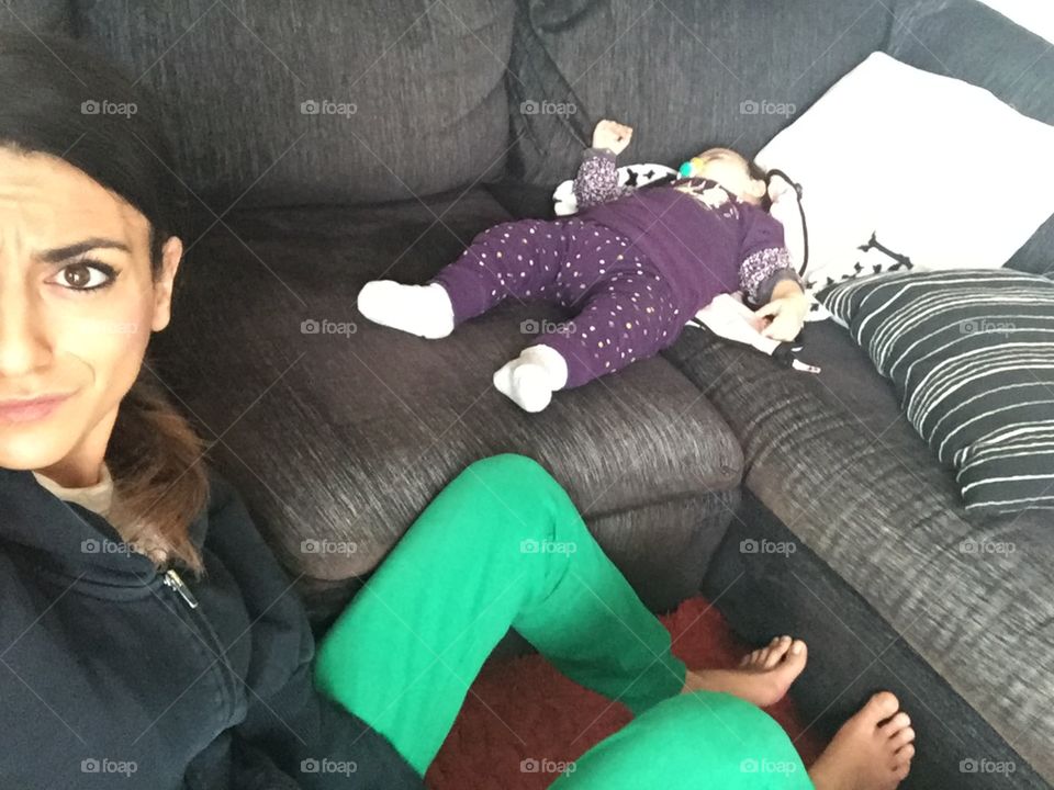 Mom and daughter on the couch 
 