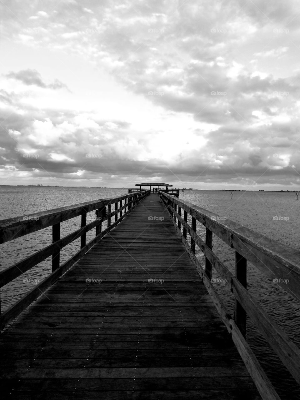 Looking down towards the long pier on a quiet peaceful day.