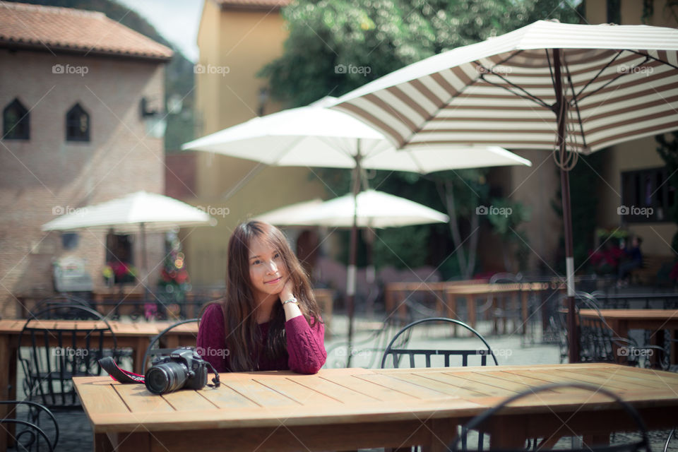 Asian girl in the italic cafe