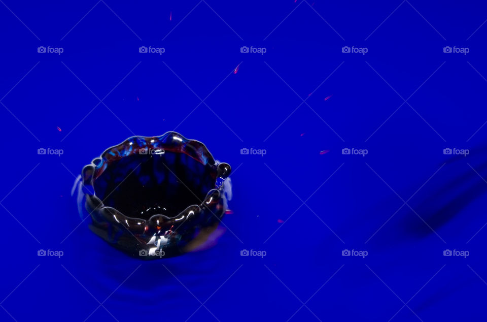 Water Drop - Red with blue background