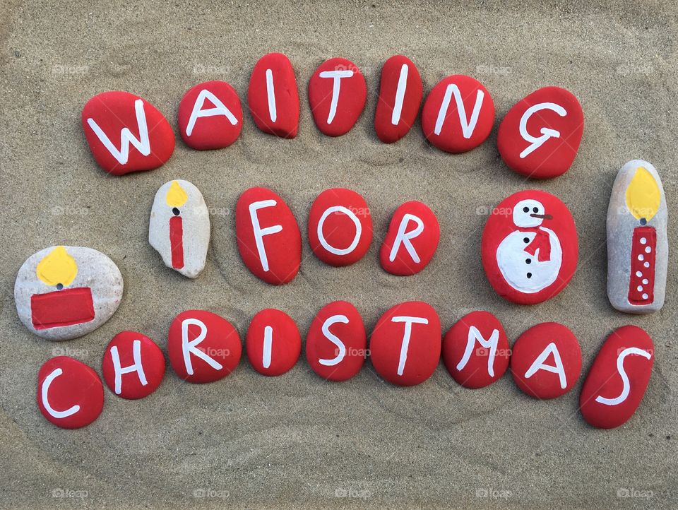 Waiting for Christmas message on painted stones