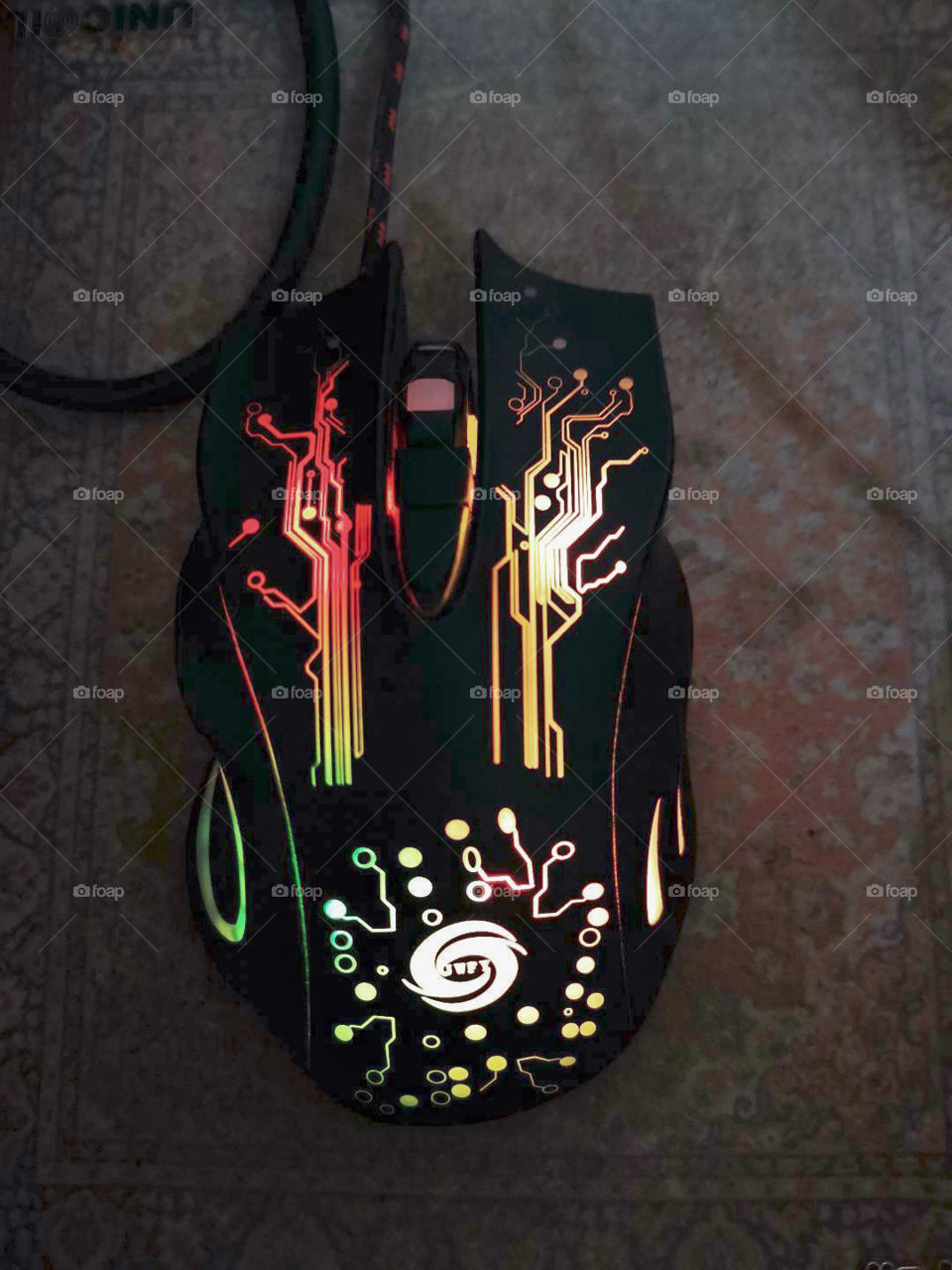 Mouse with lighted drawings.