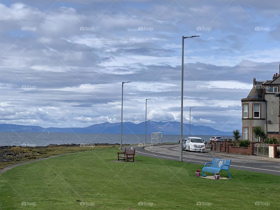 Pleasant landscape with combination of clouds and green grass