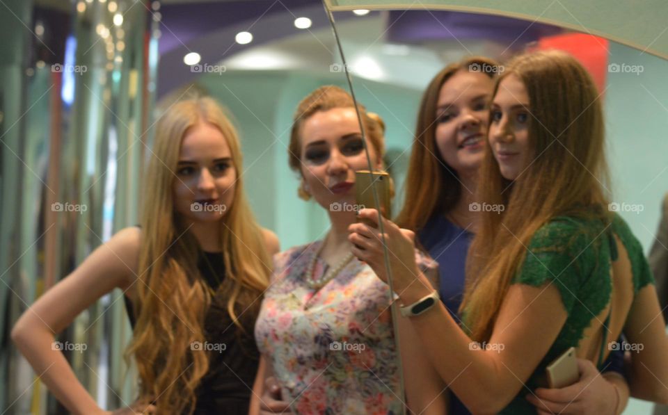 Girls friends beautiful portraits mirror selfie