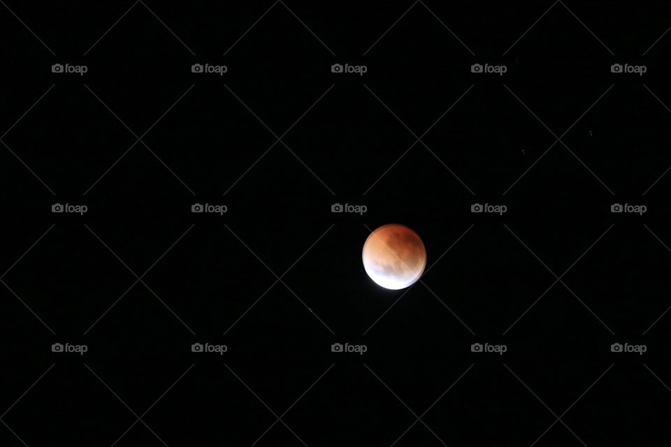 Lunar blood moon eclipse 2018 in South Australia night sky, moon crescent 