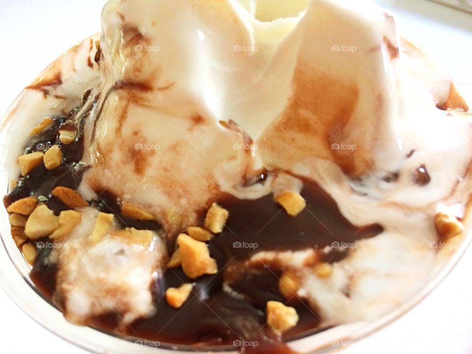 Elevated view of ice cream sundae in bowl