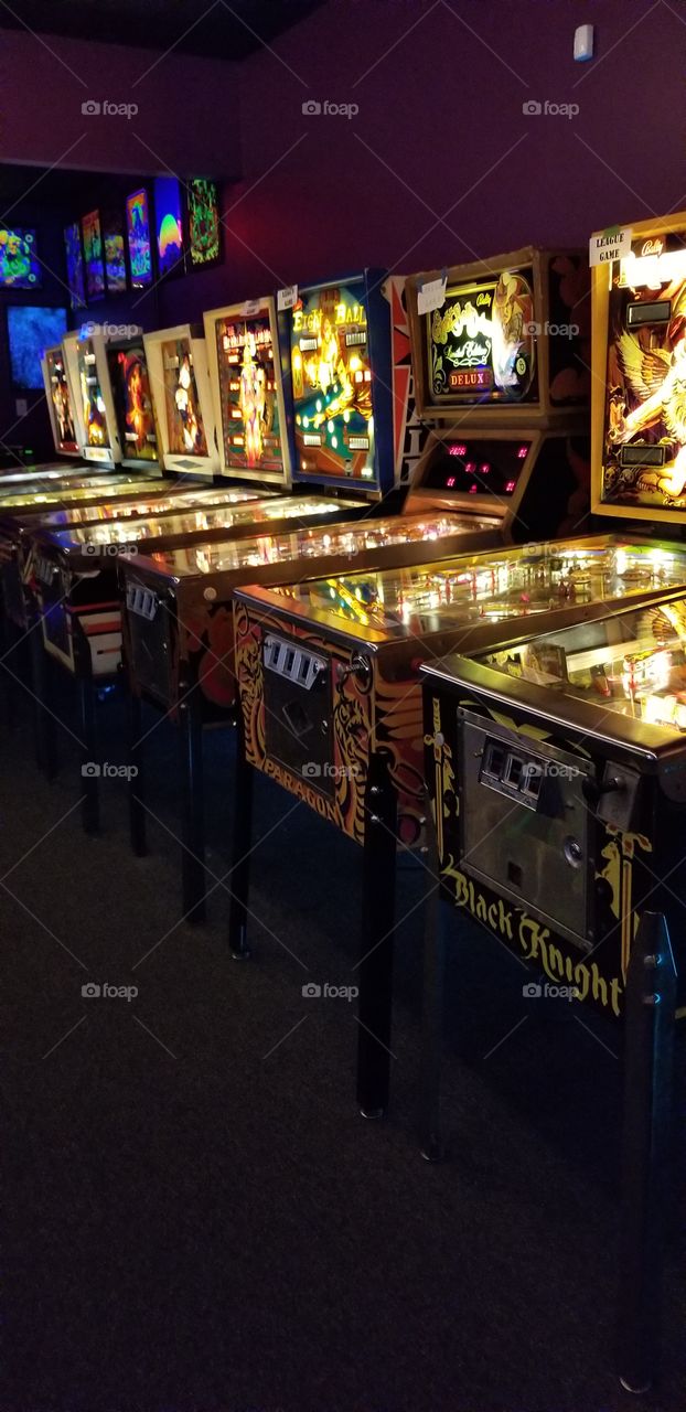 Amazing collection of vintage Pinball Machines.  Can you get the high score?
