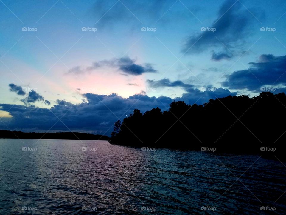 colorful sky during the sunset on the lake