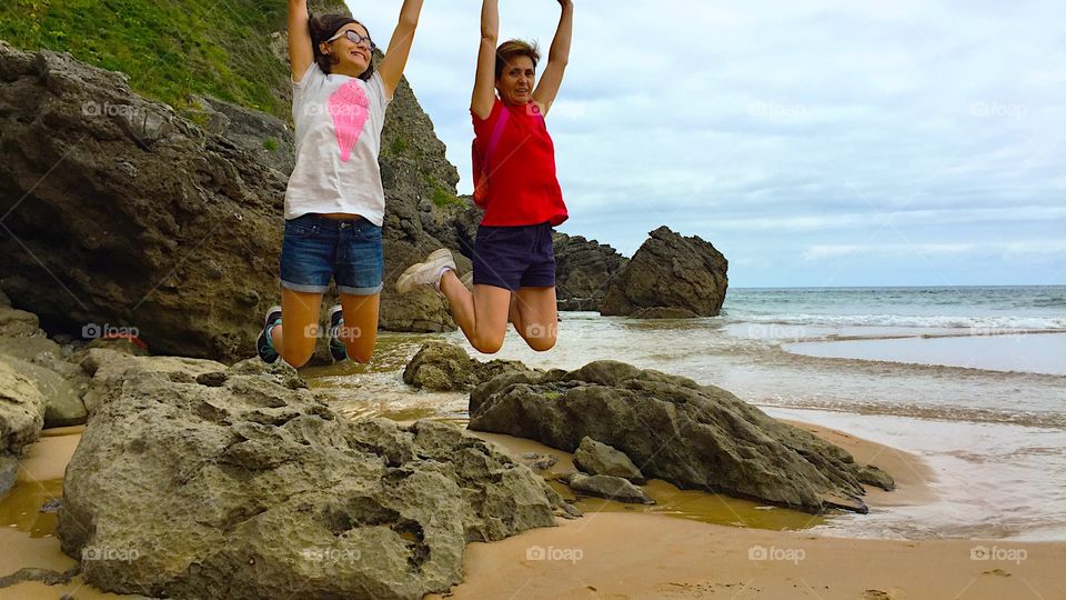 Jumping at the beach 
