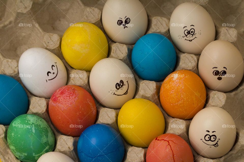 funny eggs with painted faces expressing different emotions. Happy Easter concept .