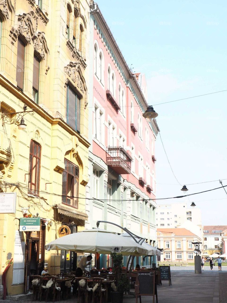 Colorful houses in the streets with cute cafés in the street.