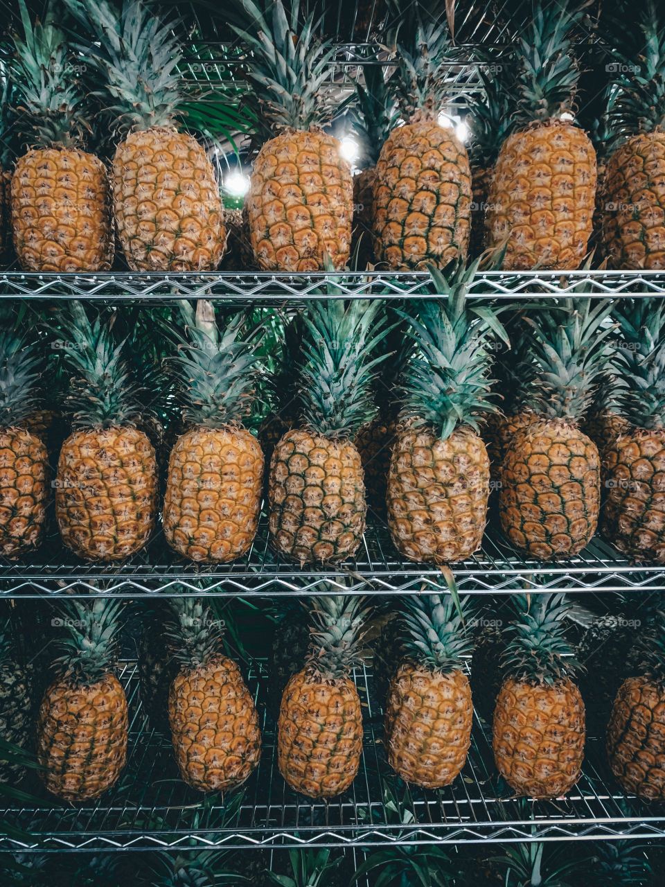 Fresh pineapple on the shelf awaits buyers in Hawaii. 