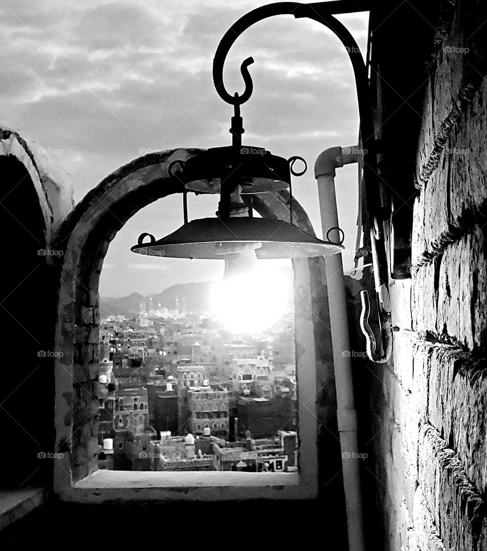 An antique lamp in an old building