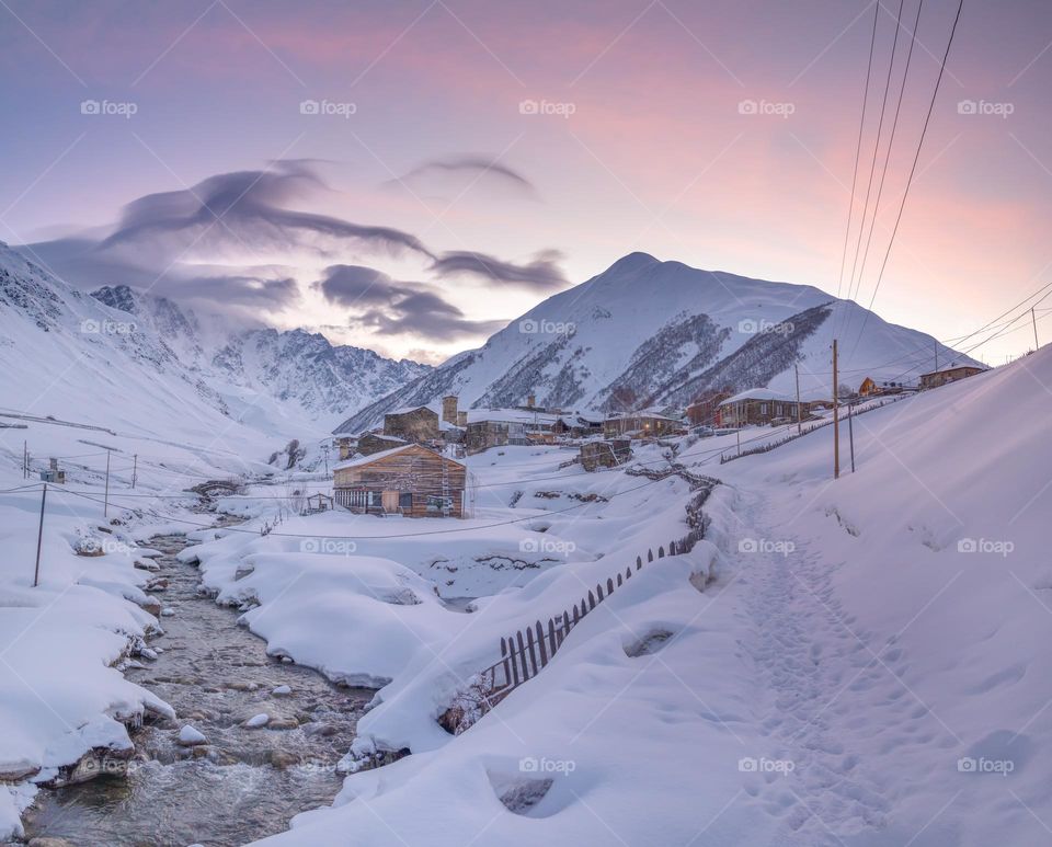 Sunrise over snow mountain