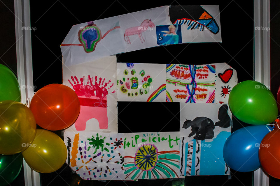 Clash of Colours: Every year on the night before my daughters birthdays I put a big number in our front window of the age they are turning. Sometimes its their art or a collection of pictures since their last birthday. Its very special for us all! ๐