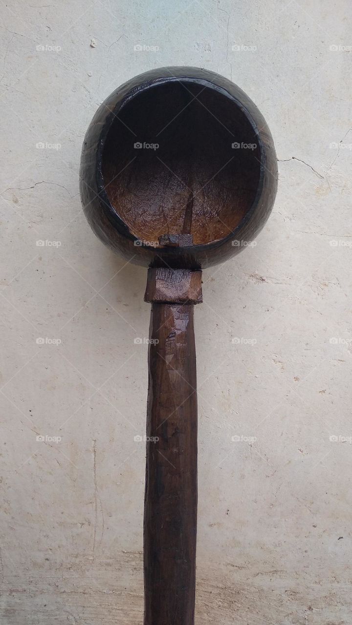 The ancient dipper is made of coconut skin and wood