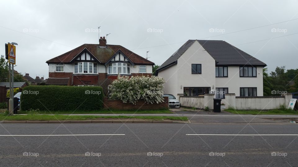 semi detached and a large detached house. England
