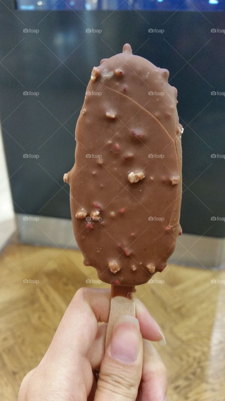 One hand, one ice-cream