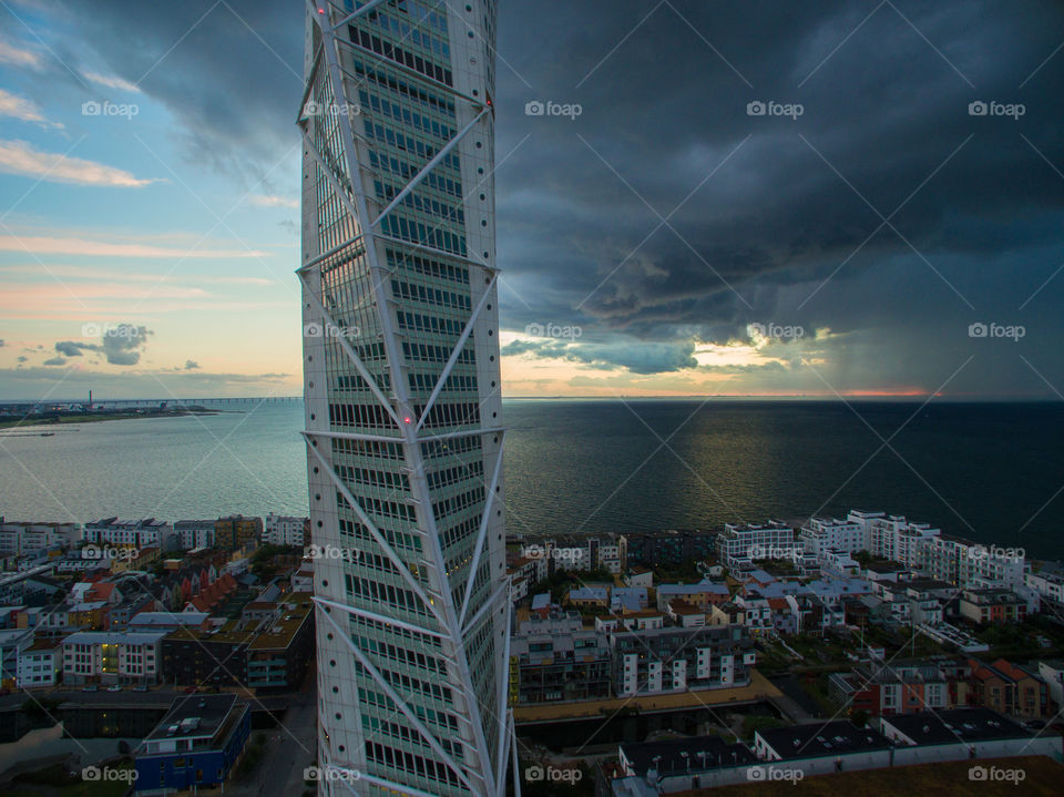 Storm over the city of Malmö in Sweden. Skyscraper Turning Torso at west harbour.