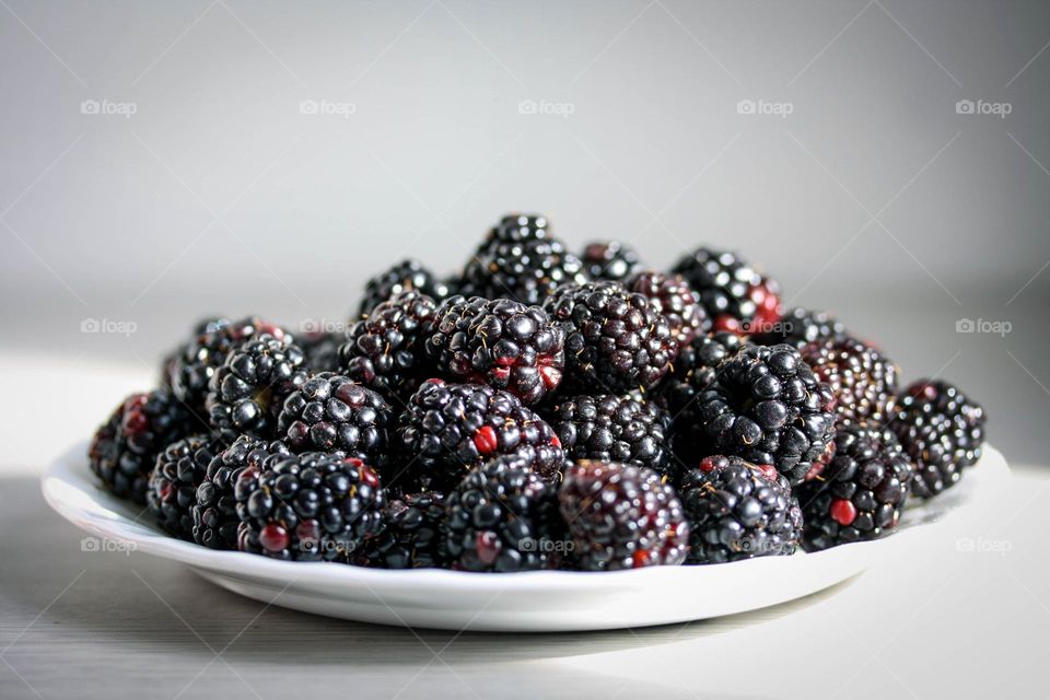 Beautiful blackberries on a plate