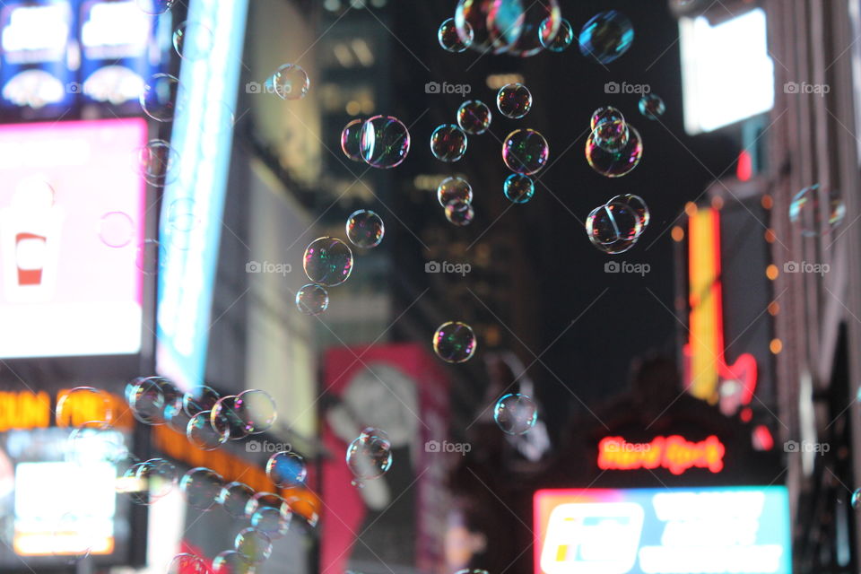 The bubbles are having a bubble party in Times Square 