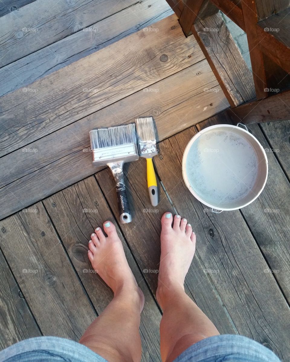 Old wooden deck gets some care