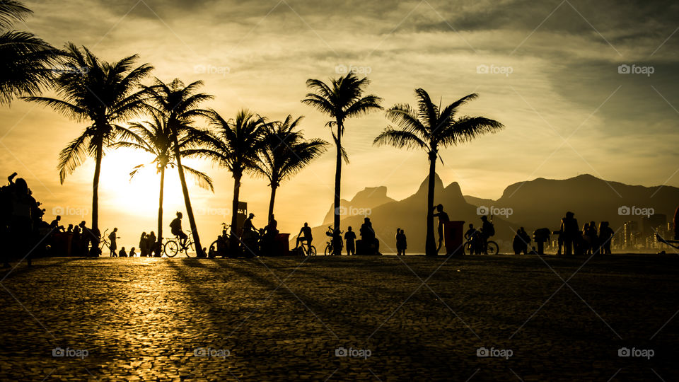 Silhuette shot on the beach of the Arpoador Rio _Brazil; by a Nikon fuul frame.