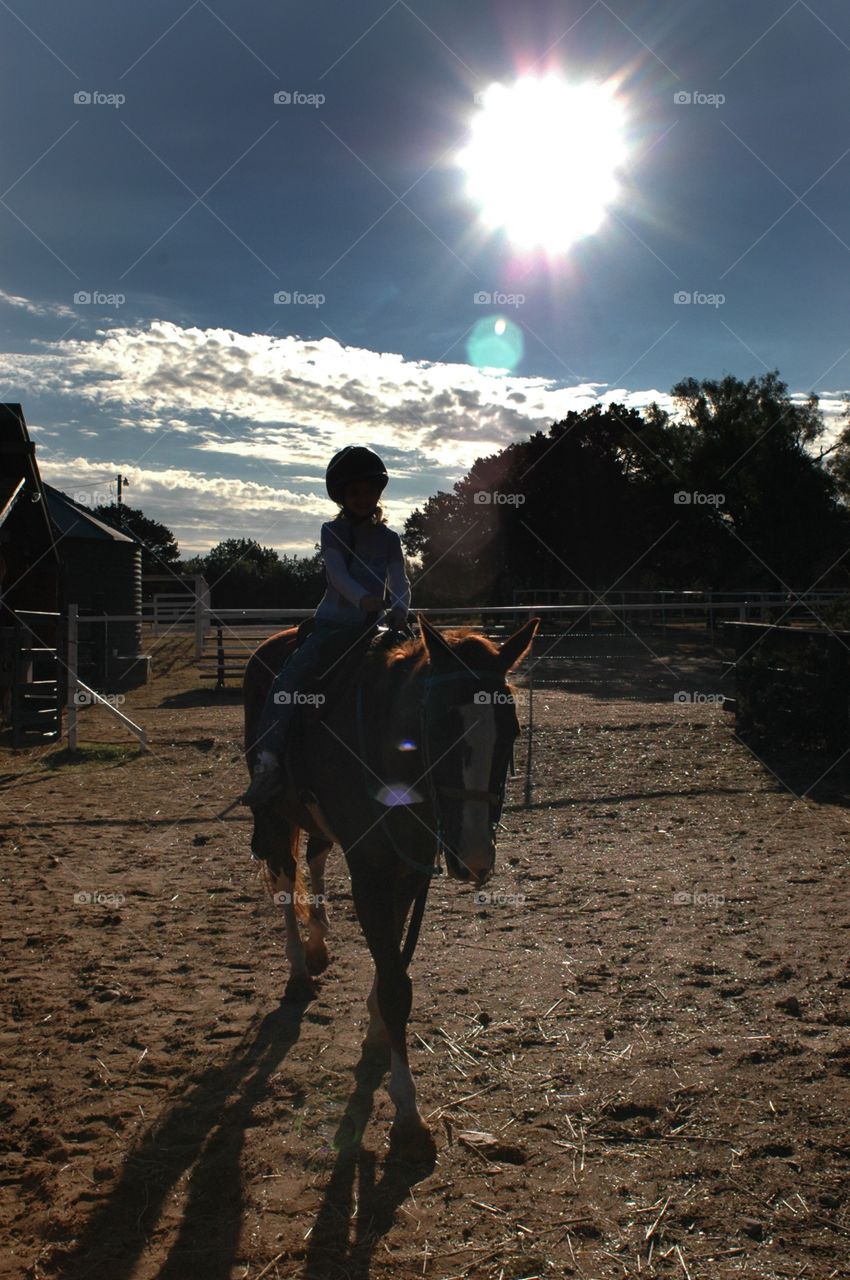 Young rider on a horse
